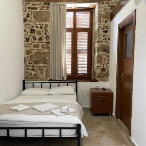 A bed or beds in a room at Held Hotel