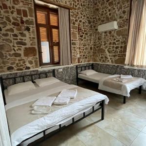 A bed or beds in a room at Held Hotel