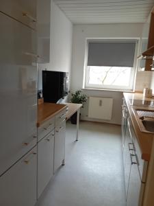 Kuhinja oz. manjša kuhinja v nastanitvi Wohnung mit Balkon in Fürth