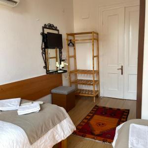 A bed or beds in a room at Held Hotel