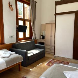 A bed or beds in a room at Held Hotel