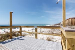 a balcony with a view of the beach at Azure in Fort Walton Beach