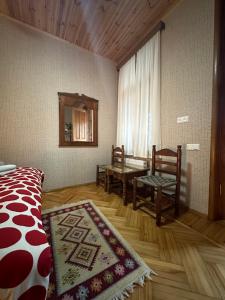 Voodi või voodid majutusasutuse Guesthouse Litoros toas