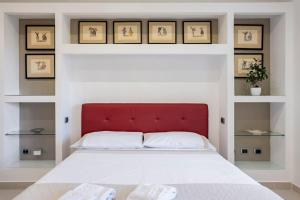 A bed or beds in a room at Appartamento Le Zagare