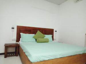 Voodi või voodid majutusasutuse White Villa Hotel toas