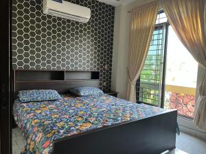 Uptown Residences客房内的一张或多张床位