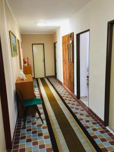 A bed or beds in a room at Rodinný RETRO domček
