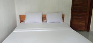 Bayan Exotic Homestay客房内的一张或多张床位