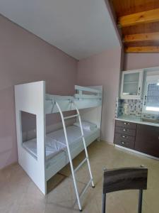 Postel nebo postele na pokoji v ubytování Villa-Leandro