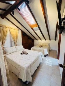 Ένα ή περισσότερα κρεβάτια σε δωμάτιο στο Apartamento El Refugio