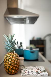 a pineapple sitting on a counter in a kitchen at Silvia’s Home in Monopoli