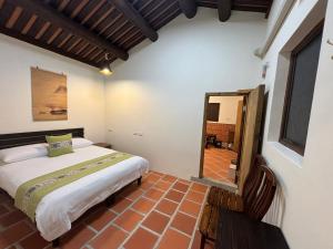 Giường trong phòng chung tại Ba Ba Guan Hai Ancient House B&B