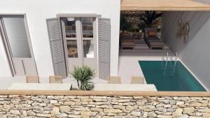 Pnoes Skyros في سكيروس: تقديم منزل به مسبح