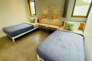 Cama o camas de una habitación en Private Garden Villa