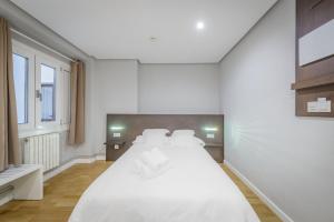 Posteľ alebo postele v izbe v ubytovaní Hotel Mogay