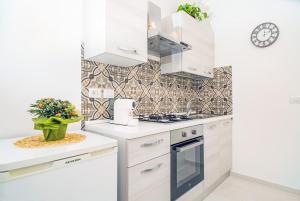 Η κουζίνα ή μικρή κουζίνα στο B&B Alba 2 +10 φωτογραφίες