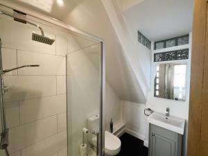 Koupelna v ubytování Cross Street Apartment + 37 fotografií