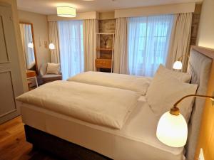 Letto o letti in una camera di Hotel Weissenstein
