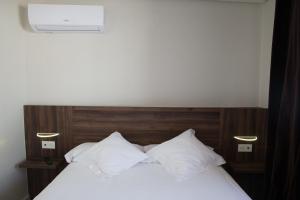 Posteľ alebo postele v izbe v ubytovaní Hotel Mogay