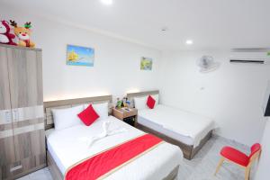 Postel nebo postele na pokoji v ubytování SKY HOTEL + 26 fotografií