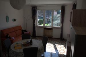 Χώρος καθιστικού στο Andy Apt zona tranquilla vicino centro e spiaggia