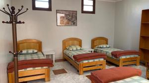 Кровать или кровати в номере Auberge de Jeunesse Marrakech-Asni