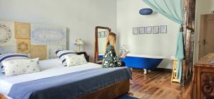 Cama ou camas em um quarto em Santa Maria Hostel