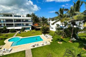 an aerial view of a resort with a swimming pool at La Fenice Beachfront 3 Bedroom With Parking in Las Terrenas
