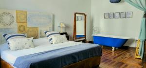 Cama ou camas em um quarto em Santa Maria Hostel