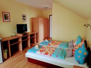Posteľ alebo postele v izbe v ubytovaní Haus Maria Appartements