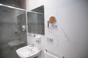 Kúpeľňa v ubytovaní Restaurante Hotel Abadesa