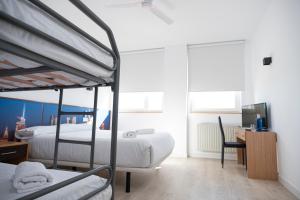Posteľ alebo postele v izbe v ubytovaní Restaurante Hotel Abadesa