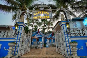 a gate to the disney courtyard at the disneyland resort at Lacasita Villas & Cottages near Anjuna Beach & Shiva Valley in Anjuna