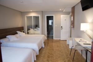 Posteľ alebo postele v izbe v ubytovaní Hotel Mogay