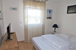 Fotografia z galérie ubytovania Superbe appartement avec WIFI, petite vue mer à TREGASTEL - Réf 26 v destinácii Trégastel