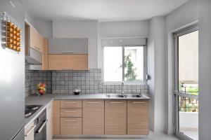 Billede fra billedgalleriet på Varkiza Sea Front Residence by First Class Properties i Vári