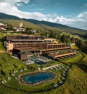 an aerial view of a resort with boats in front of it at Santre dolomythic home in Bressanone