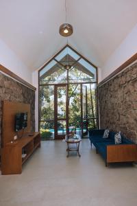 Posezení v ubytování Elixir Woods Luxury Resort And Spa, Munnar