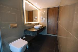 Ein Badezimmer in der Unterkunft Elixir Woods Luxury Resort And Spa, Munnar