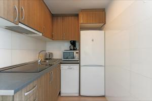 Kuchyň nebo kuchyňský kout v ubytování Apartamento Seven Seas