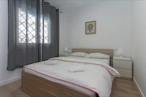 Postel nebo postele na pokoji v ubytování Apartamento Seven Seas