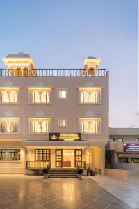 a large building with a lot of windows at Hotel The Royal Courtyard in Udaipur