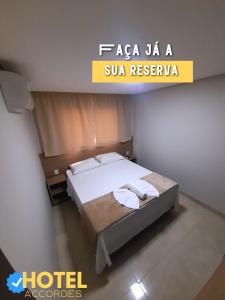 Ein Bett oder Betten in einem Zimmer der Unterkunft Hotel Accordes