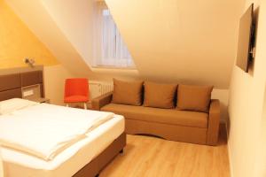 Posezení v ubytování Isar City Hotel