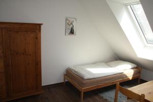 En eller flere senge i et værelse på Paschen Monteurzimmer
