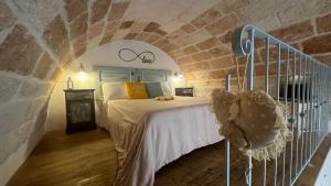 A bed or beds in a room at B&B Casa Fiore