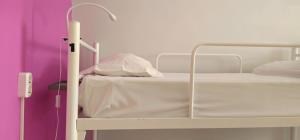 Cama ou camas em um quarto em Santa Maria Hostel