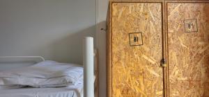 Cama ou camas em um quarto em Santa Maria Hostel