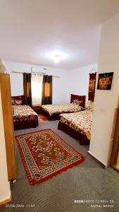 Postel nebo postele na pokoji v ubytování Petra Magic Guest House + 37 fotografií
