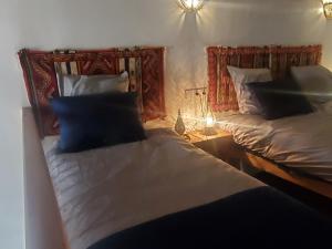 Postel nebo postele na pokoji v ubytování Riad Averroès